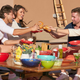 Jason Tartick, Kaitlyn Bristowe, Katie Thurston, and poor doomed Connor toast with hot dogs